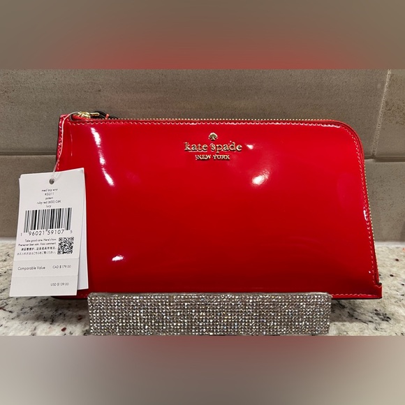 kate spade Handbags - Kate Spade Large "L" Zip Wristlet